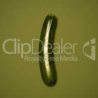 Thick green and juicy. Shot of a green marrow against a studio background.