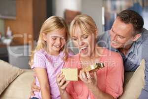 Exactly what I wanted. A little girl giving her mom a gift on her birthday.