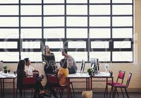 Being creative is not a job, its a way of life. Shot of creative employees having a meeting in a modern office.