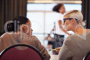 Whats the verdict. Shot of two judges discussing their decision after a dance audition.