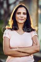 Self belief is beautiful. Portrait of an attractive and confident young woman standing outside.