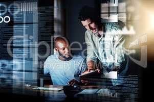 This algorithm should work. Shot of two programmers using a digital tablet while working together on a computer code at night.