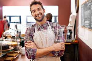 I make the best coffee in town. Shot of a barista at work.