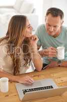 Theyre in a good financial place. Cropped shot of a couple doing their monthly budget at home.