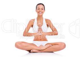 Mind and body health. Studio shot of a young woman in the lotus position isolated on white.