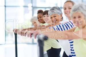Fitness for all ages. Shot of a group of women working out indoors.
