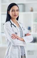 Your health concern is my concern. Portrait of a confident young doctor working in a clinic.