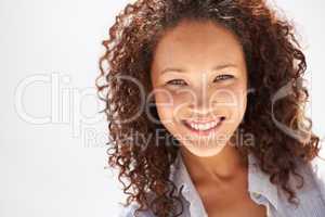 Fresh-faced and naturally beautiful. Cropped view of a naturally gorgeous young woman smiling at you.