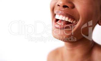 Life is better when you remain positive. Studio shot of an unrecognizable woman laughing against a white background.