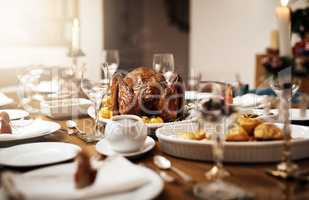 Lets get grubbing. Shot of a feast on a table at Christmas.