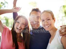 Friends feeling festive. A group of friends having fun together outdoors.