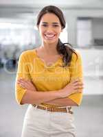 Bringing her smile to work everyday. Cropped portrait of an attractive young businesswoman in the office.