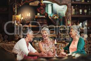 Friendship makes the golden years the best of years. Cropped shot of a group of senior female friends enjoying a lunch date.