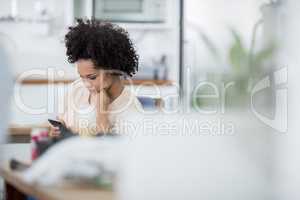 Texting at work. Real life businesspeople shot on location. Since these locations are the real thing, and not shot in an "office studio", high ISO levels are sometimes needed to catch the moment. The ISO range is between 250-600 so it should be fine for m