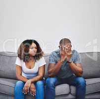 Have the walls closed in on their relationship. Shot of a young couple having relationship problems at home.