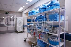 Organization is essential to running a hospital. Shot of shelves stocked with medical supplies in an empty hospital ward.