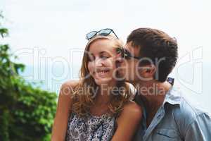 Never hesitate to express your love. Shot of a happy young couple spending time together outdoors.