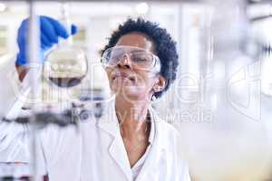 This could be the next groundbreaking discovery. Shot of a female scientist working in a lab.