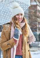 Everyone loves summer but I adore winter. Portrait of an attractive young woman enjoying being out in the snow.