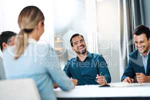 Driven by ambition. Shot of a group of businesspeople having a meeting in an office.