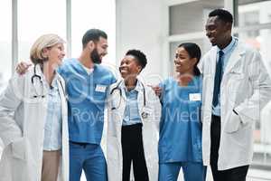 Fostering excellence in healthcare as a dedicated team. Shot of a group of medical practitioners standing together in a hospital.