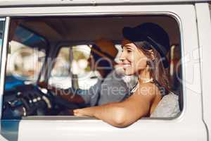 Life is out there. Go to it. Shot of two happy young friends enjoying a relaxing road trip.