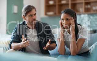 I dont want to talk right now. Shot of a young couple having an argument at home.