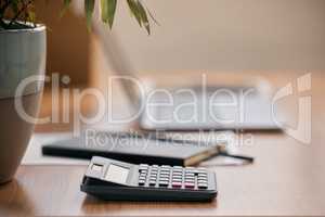 In business, we need to be calculated. Still life shot of a calculator on a desk in an office.