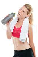 Care for the body is care for life. Studio shot of an athletic young woman holding a water bottle.