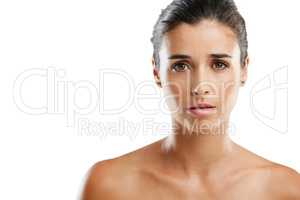 Flawless beauty. Studio portrait of a beautiful young woman with a flawless complexion isolated on white.