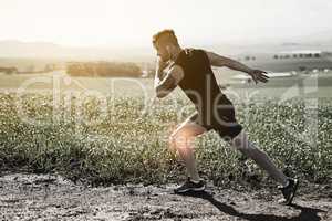 Injuries are part of the package. Full length shot of a young man running with an injury highlighted by cgi.
