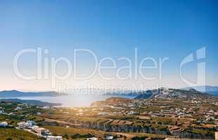 The land stretches for miles. Background shot of a beautiful shoreline landscape in the mediterranean during the day.