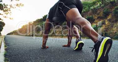 Sprint towards the lifestyle you want. Rearview shot of a sporty young man exercising outdoors.