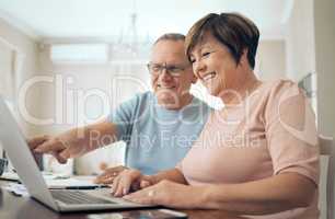 Our plans seem to shaping up. Shot of a mature husband and wife using a laptop together.
