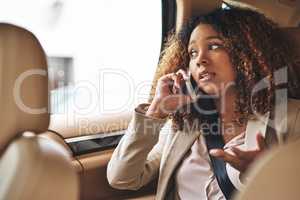 Please sort this out before I get to the office. Shot of an attractive businesswoman on a call while on her morning commute.