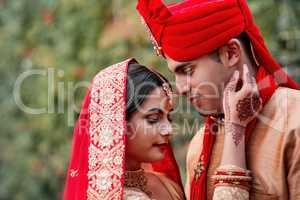 This is the start of something beautiful. Cropped shot of a young hindu couple on their wedding day.