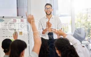 Theyve been listening. Cropped shot of a handsome young businessman giving a presentation in the conference hall.