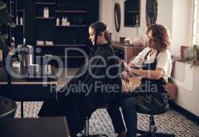 She always do a good job with my hair. Shot of a hairstylist cutting a clients hair in a salon.