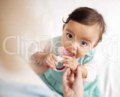 I hope this helps with the itching. Shot of an adorable little girl playing with a teething toy.