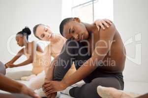 Youre not alone. Studio shot of a young ballet dancer having a stressful day in a dance studio.