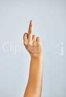 Heres my opinion. Studio shot of an unrecognizable woman showing her middle finger against a grey background.