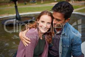 Our first date turned out to be a walk in the park. Shot of a smiling young couple enjoying the day together at the park.