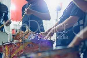 Getting into the groove. Shot of a group of musical performers playing together indoors.