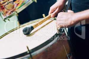 Feel the beat in your soul. Cropped shot of a group of unrecognizable male drummers playing at Carnival.