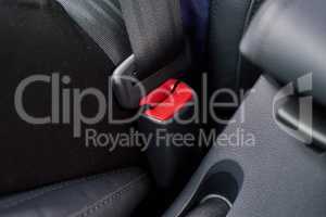 Buckle up. Closeup shot of a seatbelt inside a motor vehicle.