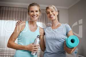 Lets get one thing straight... Were not. Portrait of two mature women getting ready for their workout at home.