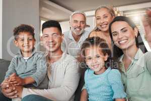 A picture perfect family. Shot of a family taking a selfie together at home.