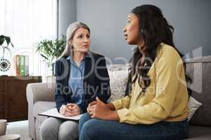 Im interested in hearing about your plans. Shot of a young woman having a meeting with her advisor.