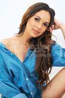 It all starts with confidence.... Cropped shot of a beautiful young woman posing in a denim shirt.