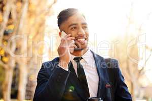 Do you have a minute to talk. Shot of a young businessman using his smartphone to make a phone call.